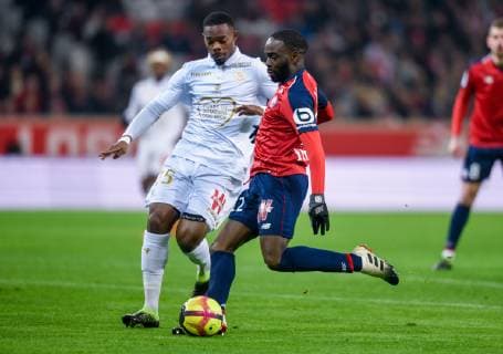 Nicolas Pepe ( LOSC ) - Wylan Cyprien ( Nice ) FOOTBALL : Lille OSC vs OGC Nice - Ligue 1 - Lille - 01 02 2019 FedericoPestellini Panoramic 
