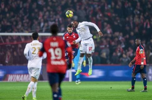 Zeki Celik ( LOSC ) - GANAGO Ignatius ( Nice ) FOOTBALL : Lille OSC vs OGC Nice - Ligue 1 - Lille - 01 02 2019 FedericoPestellini Panoramic 