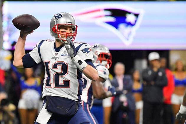 New England Patriots quarterback Tom Brady (12) throws a pass in the first quarter of Super Bowl LIII against the Los Angeles Rams at Mercedes-Benz Stadium on February 3, 2019 in Atlanta.  SBP20190203338 KEVINxDIETSCH