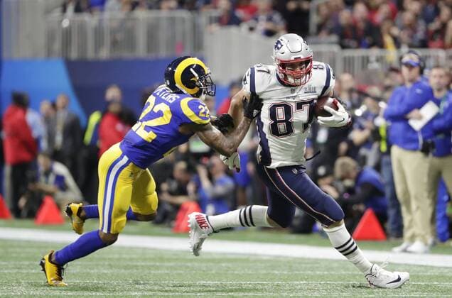 New England Patriots tight end Rob Gronkowski gains a first down on a pass reception against Los Angeles Rams in the first quarter of Super Bowl LIII at Mercedes-Benz Stadium in Atlanta on February 3, 2019. The Patriots defeated the Rams 13-3.  SBP201902033029 JOHNxANGELILLO