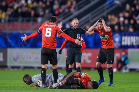 Adama Bakary Soumaoro ( LOSC ) - Edson Andre Sitoe Mexer ( Rennes ) - Mikael Lesage ( Arbitre ) FOOTBALL : Stade Rennais vs Lille OSC - Coupe de France - Rennes - 06 02 2019 FedericoPestellini Panoramic 