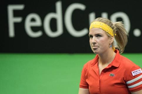 Sport Bilder des Tages Belgian Ysaline Bonaventure reacts during a doubles tennis match of Belgians Ysaline Bonaventure and Kirsten Flipkens versus French Fiona Ferro and Pauline Parmentier, the fifth and final rubber of the Fed Cup tennis meeting between Belgium and France, the quarter-finals of the World Group, Sunday 10 February 2019 in Liege. BENOITxDOPPAGNE  x05528208x