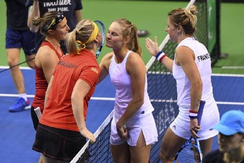 LIEGE, BELGIUM - FEBRUARY 10 : Ysaline BONAVENTURE (BEL) and Kirsten FLIPKENS (BEL) vs Fiona FERRO (FRA) and Pauline PARMENTIER (FRA) pictured during the World Group First Round Fed Cup Game between Belgium and France on February 10, 2019 in Liege, Belgium, 10 02 2019 TENNIS : France vs Belgique - Fed Cup - 10 02 2019 PHOTONEWS PANORAMIC 