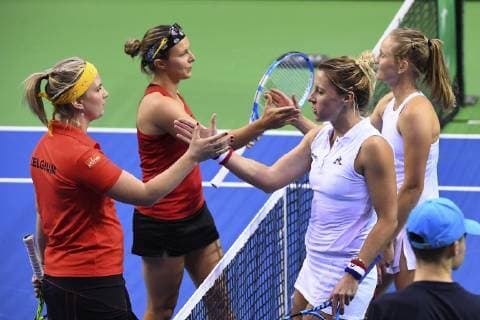 LIEGE, BELGIUM - FEBRUARY 10 : Ysaline BONAVENTURE (BEL) and Kirsten FLIPKENS (BEL) vs Fiona FERRO (FRA) and Pauline PARMENTIER (FRA) pictured during the World Group First Round Fed Cup Game between Belgium and France on February 10, 2019 in Liege, Belgium, 10 02 2019 TENNIS : France vs Belgique - Fed Cup - 10 02 2019 PHOTONEWS PANORAMIC 