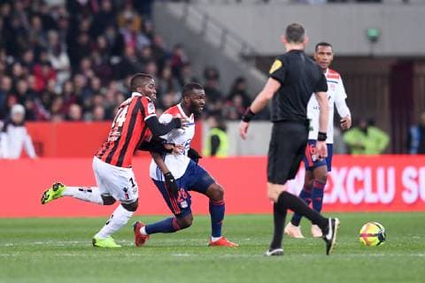 14 IGNATIUS GANAGO (NICE) - 28 TANGUY NDOMBELE (OL) FOOTBALL : Nice vs Lyon - Ligue 1 Conforama - 10 02 2019 FEP Panoramic 