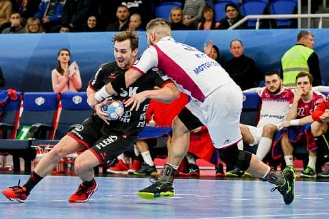 Players of HC Motor Zaporizhzhia (white kit) and SG Flensburg-Handewitt (black kit) are seen in action during the 2018 2019 VELUX EHF Champions League Group B match at the Yunist Palace of Sports, Zaporizhzhia, southeastern Ukraine, February 10, 2019. Ukrinform. EHF Champions League: Motor snatches 28-26 win over Flensburg at home  Copyright: xDmytroxSmolyenkox