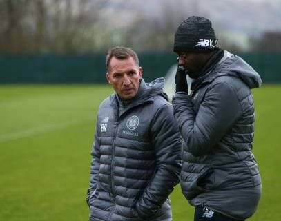 13th February 2019, Lennoxtown Training Centre, Glasgow, Scotland; Celtic Training session ahead of their Europa League tie against Valencia on 14th February; Celtic Manager Brendan Rodgers chats with coach Kolo Toure  ActionPlus12105035 VagelisxGeorgariou
