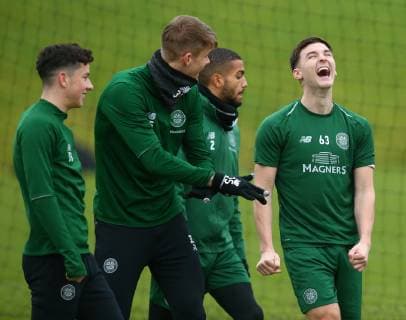 13th February 2019, Lennoxtown Training Centre, Glasgow, Scotland; Celtic Training session ahead of their Europa League tie against Valencia on 14th February; Kieran Tierney of Celtic sees the funny side of Kris Ajer  ActionPlus12105055 VagelisxGeorgariou