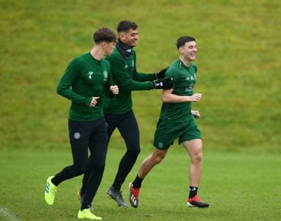 13th February 2019, Lennoxtown Training Centre, Glasgow, Scotland; Celtic Training session ahead of their Europa League tie against Valencia on 14th February; Nir Bitton and Kieran Tierney of Celtic share a joke  ActionPlus12105046 VagelisxGeorgariou