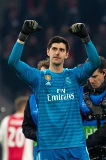Amsterdam, Netherlands, 13.02.2019, UEFA Champions League - 2018 19 Season, Viertelfinale, Ajax Amsterdam - Real Madrid, Torwart Thibaut Courtois (Real Madrid) jubelt nach dem 1:2 sieg ( DeFodi001