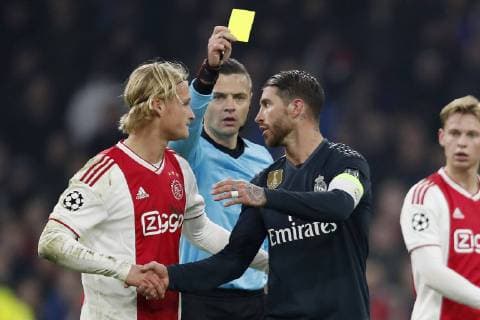 (L-R) Kasper Dolberg of Ajax, referee Damir Skomina, Sergio Ramos of Real Madrid during the UEFA Champions League round of 16 match Ajax Amsterdam and Real Madrid at the Johan Cruijff Arena on February 13, 2019 in Amsterdam, The Netherlands UEFA Champions League 2018 2019 xVIxVIxImagesx xMauricexvanxSteenxIVx 13623606