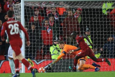 19th February 2019, Anfield, Liverpool, England; UEFA Champions League round of 16, Liverpool versus Bayern Munich; Bayern Munich goalkeeper Manuel Neuer saves from Sadio Mane of Liverpool  ActionPlus12106795 DavidxBlunsden