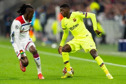 Sport Bilder des Tages Lyon, Frankreich, 19.02.2019, UEFA Champions League - 2018 19 Season, Viertelfinale, Olympique Lyon - FC Barcelona Barca Bertrand Traore (OLY) und Ousmane Dembele (FCB) im Zweikampf ( DeFodi053