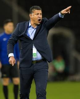 (190220) -- DOHA, Feb. 20, 2019 -- Iran s Saipa FC head coach Ali Daei reacts during the AFC Asian Champions League qualifying match between Qatar s Al Rayyan SC and Iran s Saipa FC in Doha, capital of Qatar, Feb. 19, 2019. Nikku) (SP)QATAR-DOHA-AFC CHAMPIONS LEAGUE-AL RAYYAN VS SAIPA yangyuanyong 