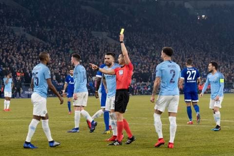 referee Carlos Del Cerro Grande give a yellow card to Fernandinho Luiz Roza of Manchester City and a penalty to FC Schalke 04 during the UEFA Champions League round of 16 match between Schalke 04 and Manchester City at Arena Auf Schalke on February 20, 2019 in Gelsenkirchen, Germany UEFA Champions League 2018 2019 xVIxVIxImagesx xGerritxvanxKeulenxIVx 13689350