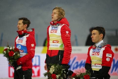 NORDIC SKIING - FIS Nordic World Ski Championships Seefeld 2019 SEEFELD,AUSTRIA,01.MAR.19 - NORDIC SKIING, Ski jumping Skispringen Ski nordisch - FIS Nordic World Ski Championships, normal hill, flower ceremony. Image shows Kamil Stoch (POL), Dawid Kubacki (POL) and Stefan Kraft (AUT). GEPAxpictures xThomasxBachun