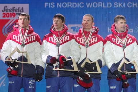 SEEFELD, TIROL, AUSTRIA - MARCH 1, 2019: Silver medalists Andrei Larkov, Alexander Bessmertnykh, Alexander Bolshunov, and Sergei Ustyugov (L-R) of Russia at a medal ceremony after the men s 4x10km cross-country skiing relay race at the 2019 FIS Nordic World Ski Championships. Sergei Bobylev TASS  TS0A2CEE