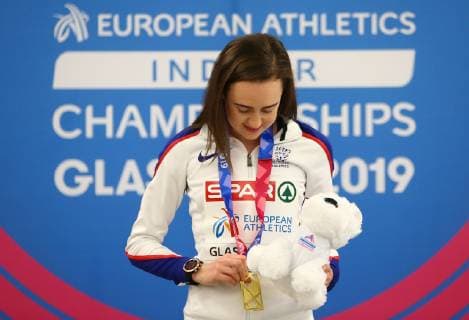 2nd March 2019, Emirates Arena, Glasgow, Scotland; European Athletics Indoor Championships, day 2; Laura Muir (GBR) looks at her gold medal for the women 3000m  ActionPlus12109879 VagelisxGeorgariou