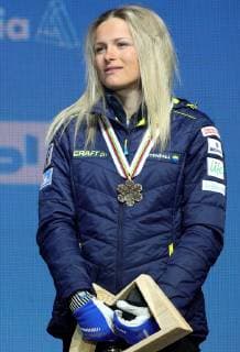 SEEFELD, TIROL, AUSTRIA â€“ MARCH 2, 2019: Cross-country skier Frida Karlsson (bronze) of Sweden poses at a medal ceremony for the ladies 30km mass start race at the 2019 FIS Nordic World Ski Championships. Sergei Bobylev TASS  TS0A2FC7