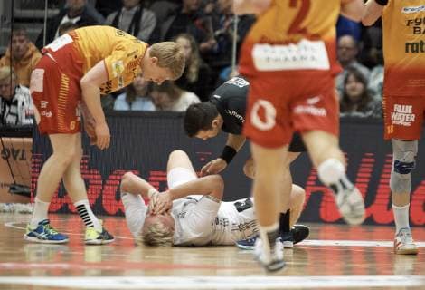Odense: EHF Cup herrehaandbold: GOG - THW Kiel. Arena Fyn i Odense, den 3. Marts 2019. Patrick Wiencek (17) faar en tur i gulvet. Foto: Robert Wengler , Odense Denmark Copyright: ©RobertxWengler RobertxWenglerx COP107 spdk20190303-160045-L