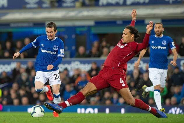March 3, 2019 - Liverpool, United Kingdom - LIVERPOOL, UK 3RD MARCH - Bernard of Everton FC is tackled by Virgil van Dijk of Liverpool during the Premier League match between Everton and Liverpool at Goodison Park, Liverpool on Sunday 3rd March 2019. (Credit: Pat Scaasi MI News) Everton FC v Liverpool FC - Premier League  - ZUMAn230 20190303_zaa_n230_496 Copyright: xMixNewsx