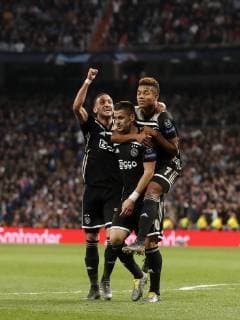 (L-R) Hakim Ziyech of Ajax, Dusan Tadic of Ajax, David Neres of Ajax during the UEFA Champions League round of 16 match between Real Madrid and Ajax Amsterdam at the Santiago Bernabeu stadium on March 05, 2019 in Madrid, Spain UEFA Champions League 2018 2019 xVIxVIxImagesx xMauricexvanxSteenxIVx 13823621