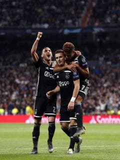 (l-r) Hakim Ziyech of Ajax, Dusan Tadic of Ajax, David Neres of Ajax during the UEFA Champions League round of 16 match between Real Madrid and Ajax Amsterdam at the Santiago Bernabeu stadium on March 05, 2019 in Madrid, Spain UEFA Champions League 2018 2019 xVIxVIxImagesx xMauricexvanxSteenxIVx 13823658