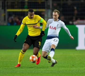 Borussia Dortmund v Tottenham Hotspur UEFA Champions League Christian Eriksen of Tottenham Hotspur (right) plays the ball as Manuel Akanji of Borussia Dortmund closes down during the UEFA Champions League match at Signal Iduna Park, Dortmund Content Not Available For UK Newspapers Copyright: xRussellxHartx FIL-12958-0036
