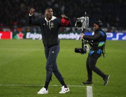 Suspended Paul Pogba of Manchester United ManU celebrates at the end of the match during the UEFA Champions League Round of Sixteen match at the Parc des Princes Stadium, Paris. Picture date: 6th March 2019. Picture credit should read: David Klein Sportimage EDITORIAL USE ONLY. No use with unauthorised audio, video, data, fixture lists, club league logos or live services. Online in-match use limited to 120 images, no video emulation. No use in betting, games or single club league player publications. _1DK6173.JPG