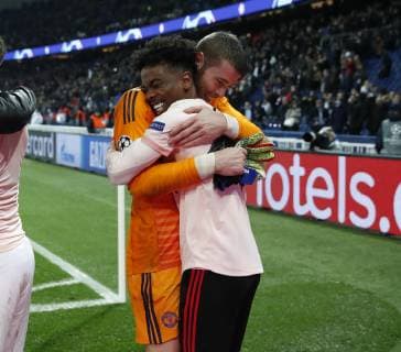 Angel Gomes of Manchester United ManU celebrates with David De Gea of Manchester United during the UEFA Champions League Round of Sixteen match at the Parc des Princes Stadium, Paris. Picture date: 6th March 2019. Picture credit should read: David Klein Sportimage EDITORIAL USE ONLY. No use with unauthorised audio, video, data, fixture lists, club league logos or live services. Online in-match use limited to 120 images, no video emulation. No use in betting, games or single club league player publications. _K2I8144.JPG