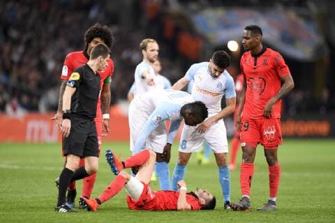 08 MORGAN SANSON (OM) - 29 CHRISTOPHE HERELLE (NICE) - 09 Mario BALOTELLI (om) - 08 Pierre LEES MELOU (nice) - BLESSURE - FAIR PLAY FOOTBALL : Marseille vs Nice - Ligue 1 Conforama - 10 03 2019 AnthonyBIBARD FEP Panoramic 
