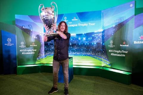 March 11, 2019 - Jakarta, Indonesia - Carles Puyol lifts the UEFA Cup trophy during UEFA Champions League Trophy Tour in Jakarta on March 11, 2019 in Jakarta, Indonesia. UEFA Champions League Trophy Tour Presented By Heineken - Jakarta  - ZUMAn230 20190311_zaa_n230_159 Copyright: xAndrewxGalx