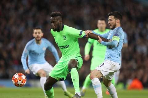 12.03.2019, Fussball, Saison 2018 2019, Champions League, Achtelfinale, Manchester City - FC Schalke 04 v. l. Salif Sane (FC Schalke 04), David Silva (Manchester City), David Silva (Manchester City) Manchester Etihad Stadium Deutschland