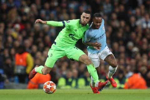 12.03.2019, Fussball, Saison 2018 2019, Champions League, Achtelfinale, Manchester City - FC Schalke 04 v. l. Nabil BENTALEB (FC Schalke 04), Raheem Sterling (Manchester City) Manchester Etihad Stadium Deutschland