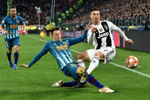 Santiago Arias of Atletico Madrid and Cristiano Ronaldo of Juventus compete for the ball during the Uefa Champions League 2018 2019 round of 16 second leg football match between Juventus and Atletico Madrid at Juventus stadium, Turin, March, 12, 2019 Foto Andrea Staccioli Insidefoto andreaxstaccioli