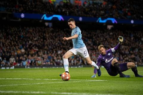 Manchester City v FC Schalke 04 UEFA Champions League Phil Foden of Manchester City goes round Schalke goalkeeper Ralf Fahrmann before making it 6-0 during the UEFA Champions League match at the Etihad Stadium, Manchester Content Not Available For UK Newspapers Copyright: xRussellxHartx FIL-12984-0036