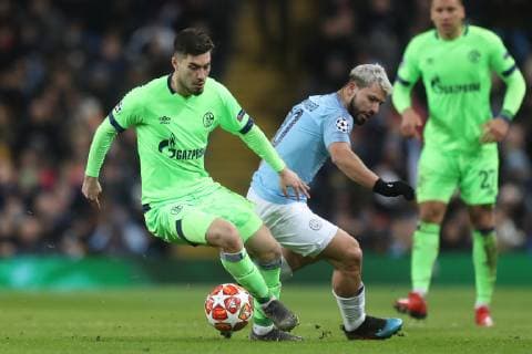 12.03.2019, Fussball, Saison 2018 2019, Champions League, Achtelfinale, Manchester City - FC Schalke 04 v. l. Suat Serdar (FC Schalke 04), Sergio Agüero (Manchester City) Manchester Etihad Stadium Deutschland