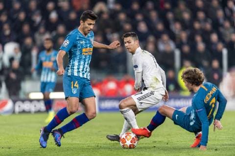 Rodrigo Hernandez Cascante (Atletico de Madrid) Cristiano Ronaldo dos Santos Aveiro (Juventus) Antoine Griezmann (Atletico de Madrid) during the Uefa Champions League Round of 16 - 2nd Leg match between Juventus 3-0 Atletico de Madrid at Allianz Stadium on March 12, 2019 in Torino , Italy. Noxthirdxpartyxsales  (99023080)