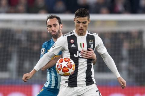 Cristiano Ronaldo dos Santos Aveiro (Juventus) Diego Roberto Godin Leal (Atletico de Madrid) during the Uefa Champions League Round of 16 - 2nd Leg match between Juventus 3-0 Atletico de Madrid at Allianz Stadium on March 12, 2019 in Torino , Italy. Noxthirdxpartyxsales  (99023214)