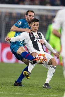 Cristiano Ronaldo dos Santos Aveiro (Juventus) Diego Roberto Godin Leal (Atletico de Madrid) during the Uefa Champions League Round of 16 - 2nd Leg match between Juventus 3-0 Atletico de Madrid at Allianz Stadium on March 12, 2019 in Torino , Italy. Noxthirdxpartyxsales  (99023216)