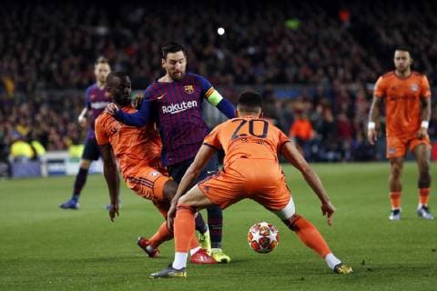 (l-r) Tanguy Ndombele of Olympique Lyonnais, Lionel Messi of FC Barcelona Barca Fernando MarÂal of Olympique Lyonnais during the UEFA Champions League round of 16 match between FC Barcelona and Olympique Lyonnais at Camp Nou on March 13, 2019 in Barcelona, Spain UEFA Champions League 2018 2019 xVIxVIxImagesx xMauricexvanxSteenxIVx 13897564