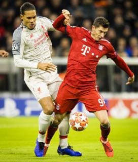 München, 13.03.2019 Virgil van Dijk (Liverpool), Robert Lewandowski (FCB) FC Bayern München - FC Liverpool