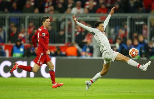 SOCCER - CL, Bayern vs Liverpool MUNICH,GERMANY,13.MAR.19 - SOCCER - UEFA Champions League, round of 16, FC Bayern Muenchen vs Liverpool FC. Image shows Robert Lewandowski (Bayern) and Trent Alexander-Arnold (Liverpool). GEPAxpictures xThomasxBachun