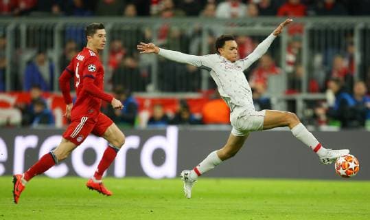 SOCCER - CL, Bayern vs Liverpool MUNICH,GERMANY,13.MAR.19 - SOCCER - UEFA Champions League, round of 16, FC Bayern Muenchen vs Liverpool FC. Image shows Robert Lewandowski (Bayern) and Trent Alexander-Arnold (Liverpool). GEPAxpictures xThomasxBachun