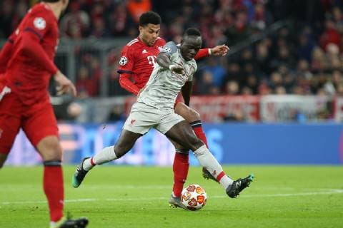 l-r: im Zweikampf, Aktion, mit Sadio Mane 10 (Liverpool FC) und Serge Gnabry 22 (FC Bayern Muenchen), FC Bayern Muenchen vs. Liverpool FC, Fussball, Champions League, Achtelfinale, 13.03.2019 Muenchen Bayern Deutschland