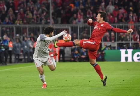 Fussball, Herren, Saison 2018 2019, Champions League (Achtelfinale, Rückspiel), FC Bayern München - FC Liverpool, v. l. Mohamed Salah (FC Liverpool), Mats Hummels (Bayern München), 13.03. 2019, Copyright: xMatthiasxKochx