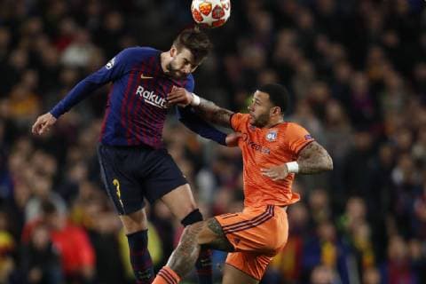 (l-r) Gerard Pique of FC Barcelona Barca Memphis Depay of Olympique Lyonnais during the UEFA Champions League round of 16 match between FC Barcelona and Olympique Lyonnais at Camp Nou on March 13, 2019 in Barcelona, Spain UEFA Champions League 2018 2019 xVIxVIxImagesx xMauricexvanxSteenxIVx 13898041