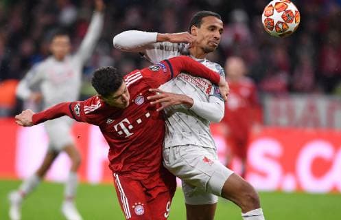 FUSSBALL CHAMPIONS LEAGUE SAISON 2018 2019 ACHTELFINAL RUECKSPIEL FC Bayern Muenchen - FC Liverpool 13.03.2019 Robert Lewandowski (li, FC Bayern Muenchen) gegen Joel Matip (re, FC Liverpool)