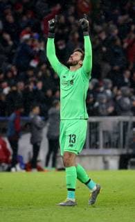 BAU 13.03.2019 München Fußball FC Bayern München vs. FC Liverpool, Alisson Becker (Liverpool) jubelt DFL REGULATIONS PROHIBIT ANY USE OF PHOTOGRAPHS AS IMAGE SEQUENCES AND OR QUASI-VIDEO. Gemäß den Vorgaben der DFL Deutsche Fußball Liga ist es untersagt, in dem Stadion und oder vom Spiel angefertigte Fotoaufnahmen in Form von Sequenzbildern und oder videoähnlichen Fotostrecken zu verwerten bzw. verwerten zu lassen.