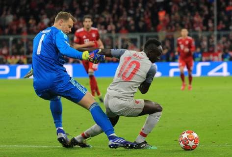 13.03.2019, CL, Champions League, Achtelfinale Rueckspiel, FC Bayern Muenchen vs FC Liverpool, Allianz Arena Muenchen , Fussball, im Bild: das 0:1 durch Sadio Mane (FC Liverpool) und Torwart Manuel Neuer (FCB) ist geschlagen DFL REGULATIONS PROHIBIT ANY USE OF PHOTOGRAPHS AS IMAGE SEQUENCES AND OR QUASI VIDEO.